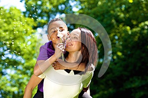 Portrait of a happy young mother with son