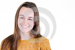 Portrait of a happy young smiling woman on a white background