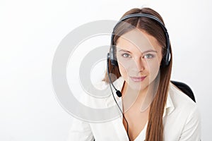 Portrait of happy young support phone operator with headset.