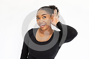 Portrait of happy young woman listening to rumors