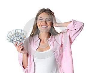 Portrait of happy young woman with money
