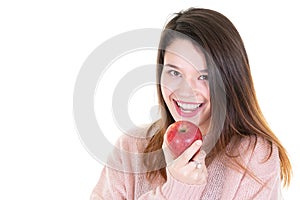 Portrait of happy young woman with red apple smiling
