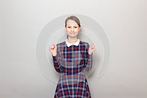 Portrait of happy young woman smiling cheerfully