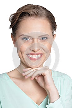 Portrait of happy young woman on white background