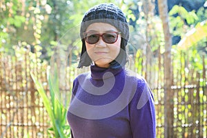 Portrait head shot of 49s years old thai woman with happiness sm