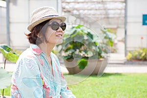 Portrait head shot face of asian woman with sun glasses and stra