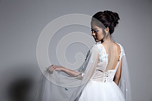 Lovely Asian Beautiful Woman bride in white wedding gown dress w