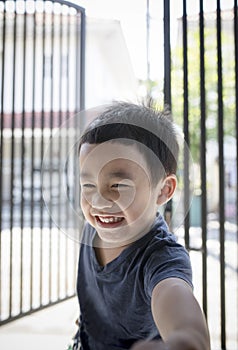 portrait headshot of asian children toothy smiling face happiness emotion