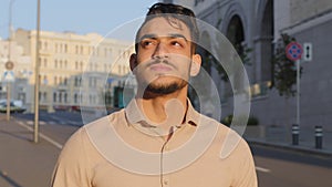 Portrait headshot close up pensive thoughtful dreaming inspired calm mindfulness Arabic Latin Indian bearded businessman