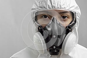 Portrait of a health worker in full protective suit