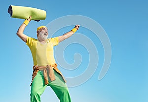 Portrait of healthy senior sport man. Cheerful aged men holding yoga mats. Exercising. Energetic for elderly sportsmen.