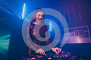 Portrait of her she nice attractive gorgeous smart popular excited cheerful cheery deejay lady playing music set having