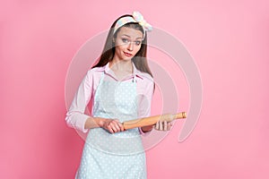Portrait of her she nice attractive skeptic funky housewife holding in hands rolling pin waiting expecting husband