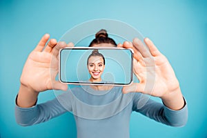 Portrait of her she nice-looking attractive sweet lovely cheerful cheery girl holding in hand cell taking selfie new