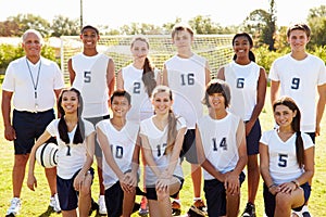 Portrait Of High School Soccer Team With Coach