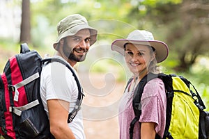 Portrait of hiker couple hiking in forest