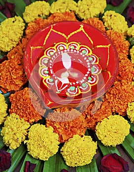 Portrait Hindu floral rangoli Diva marigolds photo