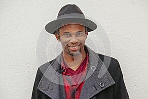 Portrait of a hipster man with black hat