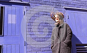 Portrait of Hipster woman with wind messing up her hair photo