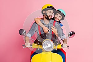 Portrait of his he her she nice attractive lovely charming careful cheerful cheery guys driving moped pastime spending