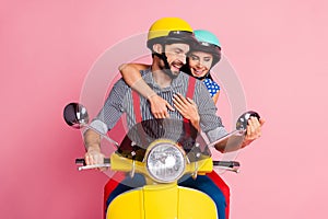 Portrait of his he her she nice attractive lovely cheerful cheery guys driving moped pastime looking in mirror enjoying