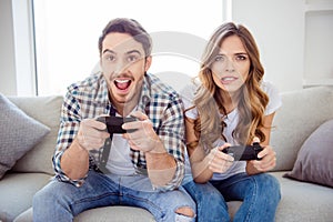 Portrait of his he her she two person nice-looking attractive charming lovely guy lady playing online internet station photo