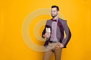 Portrait of his he nice attractive content intelligent guy holding in hands book academic business learning isolated