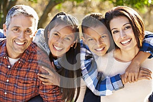 Portrait Of Hispanic Family In Countryside