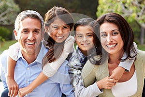 Portrait Of Hispanic Family In Countryside