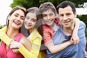 Portrait Of Hispanic Family In Countryside