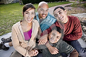 Portrait of Hispanic family outdoors