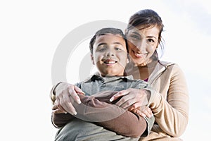 Portrait of Hispanic mother and son outdoors