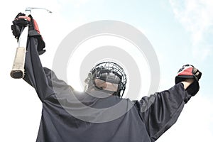 Portrait of hockey ball player with hockey stick