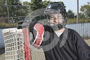 A Portrait of hockey ball player with hockey stick