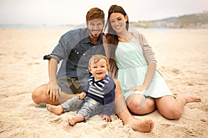 Portrait, holiday and family with smile in beach, mother and father together with cute baby boy for love. Relax, mom and