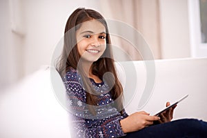 Portrait, home or kid with tablet for streaming, playing games or watching fun videos on movie website. Social media