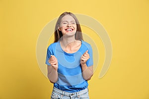 Portrait of hopeful woman on background