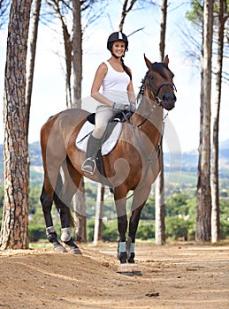 Portrait, horse riding or happy woman in nature countryside with rider or jockey for recreation or adventure. Smile