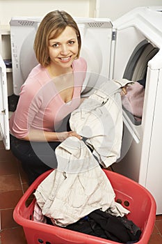 Portrait Of Housewife Doing Laundry