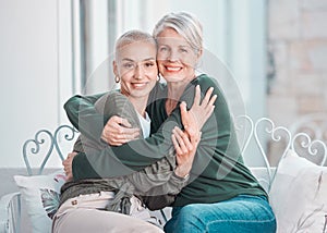Portrait, hugging and senior mother with woman in living room for bonding, love and care at home. Happy, smile and