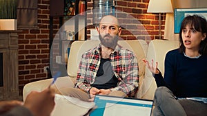 Portrait of husband attending couple therapy session