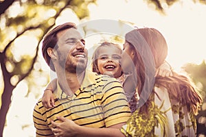 Portrait if happy family in nature. Spring season.