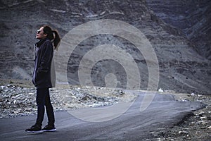 Portrait image of a beautiful Asian woman tourist standing and walking on the road