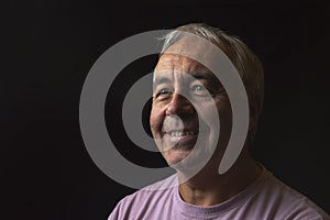 Portrait image of a happy mature man