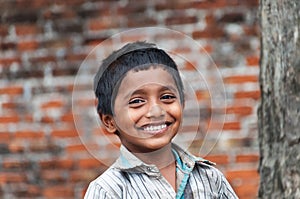 Portrait of Indian boy on the street in fishing village