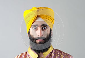 Portrait of Indian sikh man with bushy beard photo