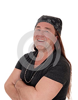 Portrait of an indigenous man laughing with his long hair