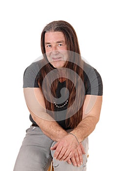 Portrait of an indigenous man with long hair