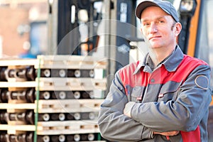 Portrait industrial worker at factory warehouse background