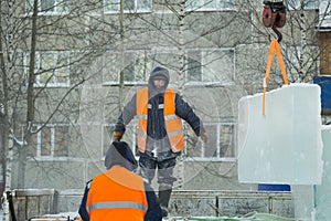 Portrait of installer at unloading ice blocks